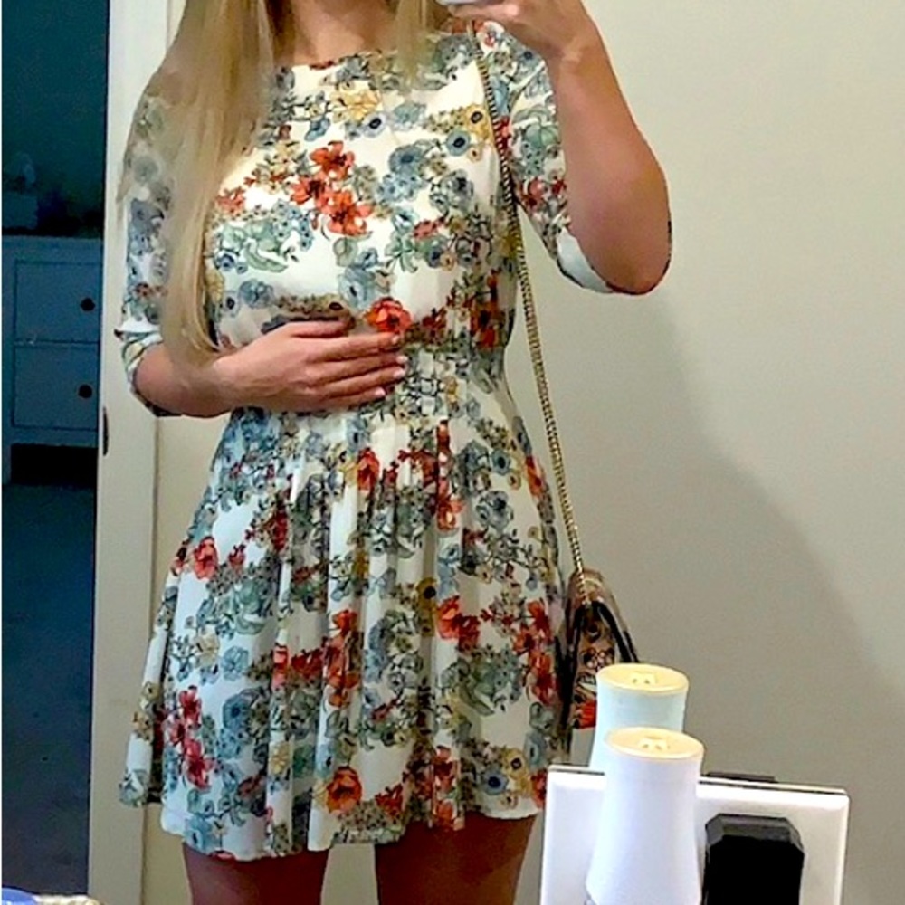 A beautiful dress with flowers, very high-quality fabric.